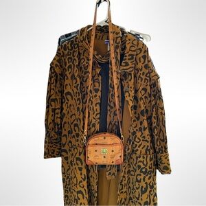 94 MCM little cross body bag.